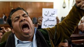 ناشط مصر خلال جلسة حكم مصرية تيران وصنافير - أ ف ب