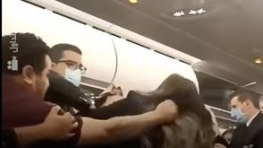 شجار على متن طائرة تونسية  يوتيوب