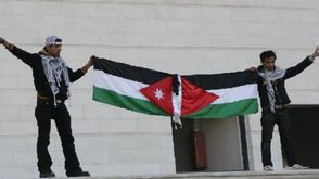 علم الاردن وفلسطين في قعالية مناصرة لفلسطين
