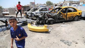 مقتل 15 وجرح 40 آخرين في تفجير 6 سيارات في بغداد - بغداد (8)