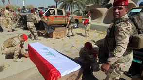 الجيش العراقي يشيع قتلاه ـ أ ف ب