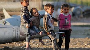أطفال سوريوم في الغوطة الشرقية - جيتي
