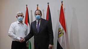 عباس كامل ويحيى السنوار- حماس