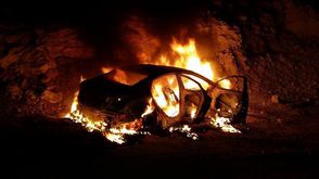 سيارة المستوطنين المختفين بعد حرقها - فيس بوك