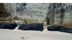 الثوار يعثرون على مقبرة جماعية في أريحا - إدلب - سوريا - بعد انسحاب قوات النظام  (الأناضول)