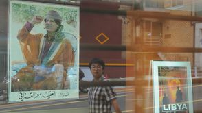 صورة للقذافي أمام مكتب التعاون الاقتصادي الليبي في سيول - جيتي
