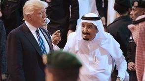 ترامب والعاهل السعودي- جيتي