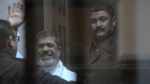 الرئيس مرسي في المحكمة جيتي