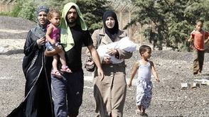 نازحون لاجئون سوريون