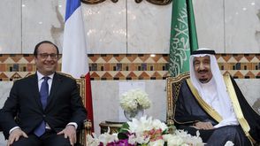 الملك سلمان بن عبد العزيز والرئيس الفرنسي فرنسوا أولاند ـ أ ف ب