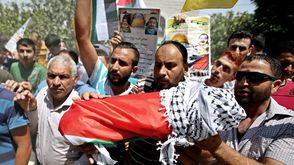 تشييع جثمان الرضيع علي الدوابشة في نابلس فلسطين ـ الأناضول
