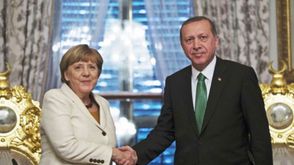 أردوغان وميركل- أرشيفية