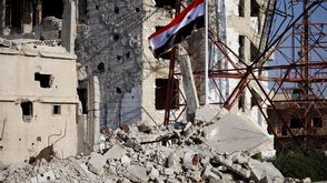 سوريا الجنوب السوري درعا علم النظام السوري - جيتي