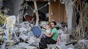 مشاهد الدمار تصدم النازحين في غزة - مشاهد الدمار تصدم النازحين في غزة (6)