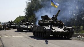 أوكرانيا  روسيا  دبابة  جنود أ ف ب