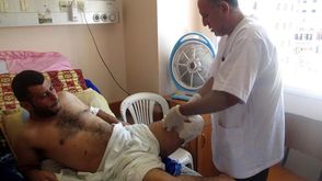 محمود سكر مواطن غزاوي فقد ساقه في الحرب - الأناضول