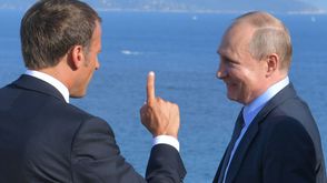 بوتين  ماكرون فرنسا روسيا - جيتي