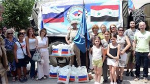 روسيا توزع مساعدات على جاليتها في سوريا- سبوتنيك