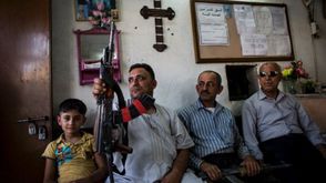 مسيحيون يحملون السلاح في العراق - أرشيفية