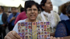 عائلات مكسيكية تطالب بتحقيق جديد في اختفاء أبنائها - أ ف ب