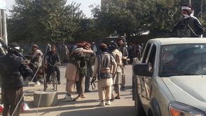مقاتلو طالبان يحتفلون بسيطرتهم على مدينة قندوز الاستراتيجية في افغانستان - أ ف ب