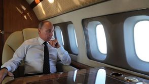 بوتين في الطائرة الرئاسية سبوتنيك