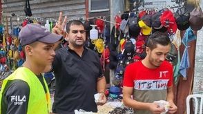 غزة توزيع حلى ابتهاج بهروب 6 اسرى من سجن جلبوع وكالة شهاب