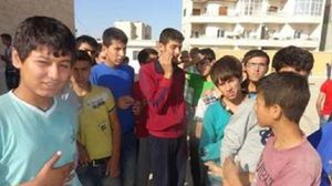 أطفال أكراد أفرج عنهم تنظيم الدولة في كوباني - أ ف ب