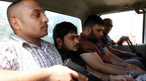 أفراد عصابة خطف بعد القبض عليهم في بغداد - أرشيفية