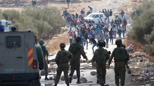 حذر من تداعيات الانتفاضة وانخراط فلسطينيي 48 في العمل المقاوم - أ ف ب