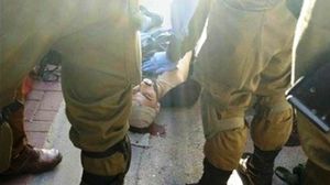 الشهيد القواسمة مسجى على الأرض بعد قتله برصاص المستوطن - فيسبوك