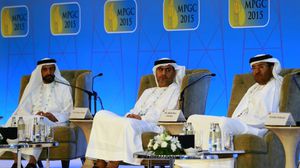 المسؤولون في شركة "أدنوك" خلال حضور مؤتمر الشرق الأوسط والغاز في أبو ظبي - أ ف ب