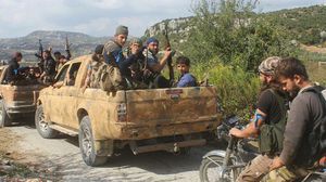 مقاتلون من "صقور الشام" لحظة انطلاقهم لخوض معارك جبل الأكراد - تويتر