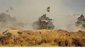 تشترك المليشيات الشيعية في معركة الموصل التي تسكنها غالبية سنية - أ ف ب