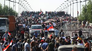 متظاهرون حاولوا السبت اقتحام المنطقة الخضراء وسط بغداد- جيتي
