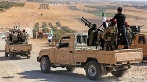 قوات المعارضة السورية تتعاون مع تركيا في عملية "نبع السلام" في الشمال السوري- جيتي