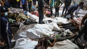 جثث الشهداء تتكدس في مستشفى الشفاء بغزة- جيتي