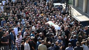 تشييع جثمان الصحفي عصام عبد الله- الأناضول