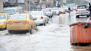 أحد الشوارع في بغداد وقد غرق من شدة الأمطار