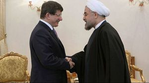 وزير الخارجية التركي خلال لقائه بالرئيس الإيراني في طهران الخميس