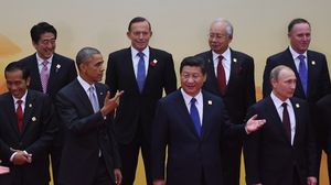 قادة المنتدى الاقتصادي لدول آسيا والمحيط الهادي (آبيك) في قمة بكين - أ ف ب
