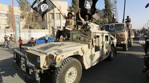 عرض عسكري لعناصر داعش في الرقة - أرشيفية