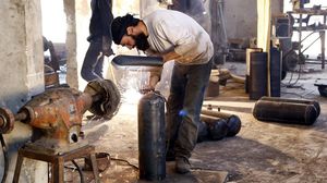 ورشة تصنيع سلاح في حلب - الأناضول