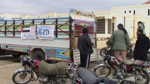 قيام الإدارة المدنية بتوزيع مساعدات غذائية في محافظة القنيطرة ـ فيسبوك