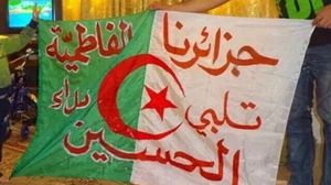 شاب جزائري يرفع شعارات طائفية على علم الجزائر- أرشيفية