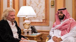 برنانسون خلال لقاء سابق مع ولي العهد السعودي محمد بن سلمان- أ ف ب (أرشيفية)