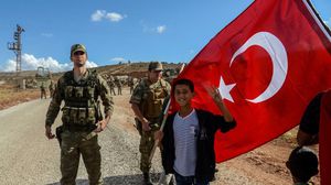ارتفعت مؤخرا حدة التهديدات التركية بعملية عسكرية في مدينة عفرين- جيتي 
