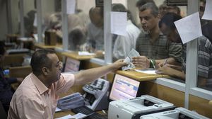 يعد ملف الموظفين أحد الملفات المعقدة في تفاهمات المصالحة بين حركتي حماس وفتح- جيتي 