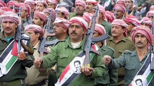 عناصر مسلحة تتبع حزب البعث العراقي إبان حكم الرئيس الراحل صدام حسين- تويتر