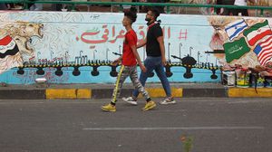 جدارية ببغداد ترفض التدخل الخارجي في شؤون البلاد- جيتي